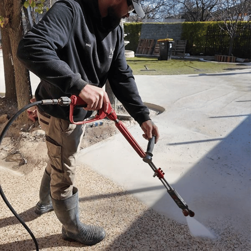 Person using a Jetwave Hornet G2 280-15 (E-Start) – Concreting Pack on a driveway