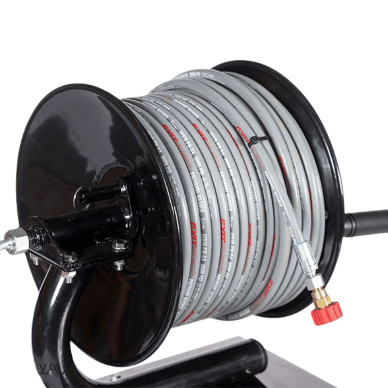 Black reel with coiled hose on a white background