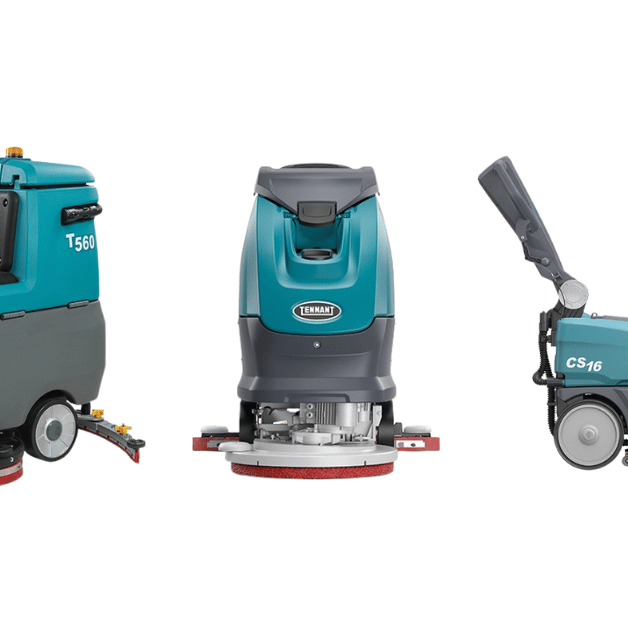 Three Tennant floor scrubbers side by side on a blank white background