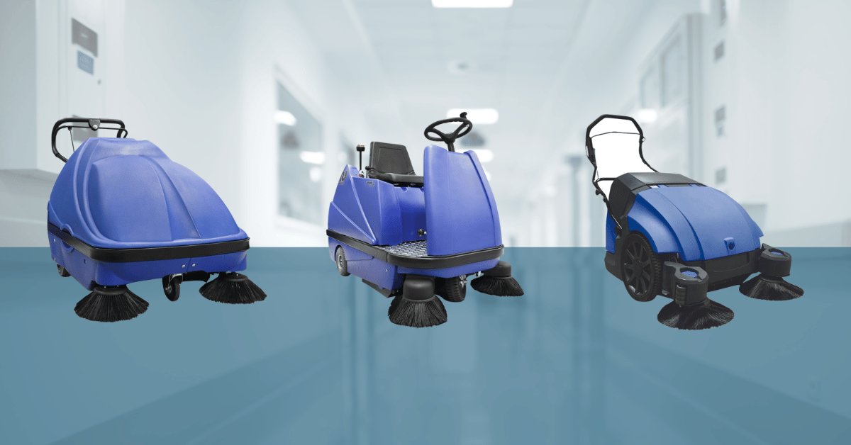 Three Stolzenberg Suresweep Industrial Vacuum Floor Sweepers side by side in front of a hospital setting background with a hint of blue
