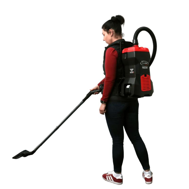 Person using a Cleanstar Prostar backpack vacuum cleaner on a white background