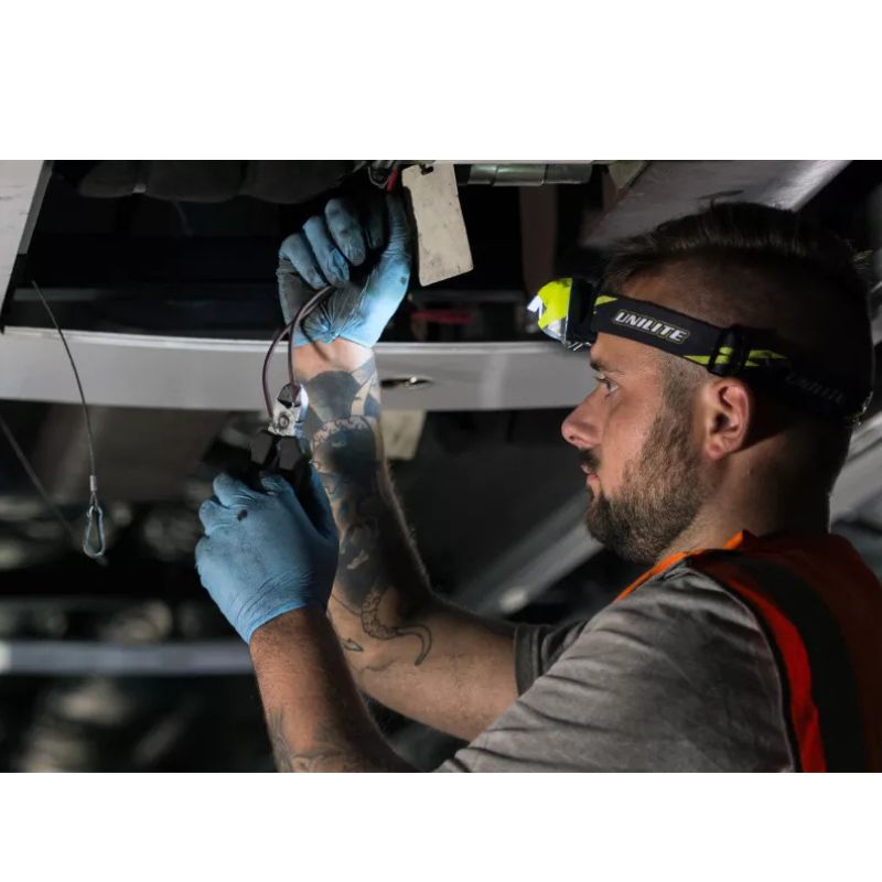 JSP Powercap Infinity LED Headlamp worker wearing JSP Powercap while working overhead