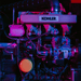 Kohler Jetwave Executive Silent 280-31 Hot Water Diesel Pressure Cleaner engine with vibrant pink and blue lighting on a dark background