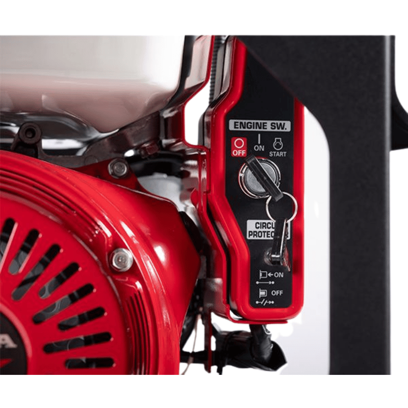 Close-up of a red engine with control panel on a white background