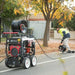 Jetwave Scorpion G2FI 275-20 Cold Water Pressure Cleaner doing pumping on the street.