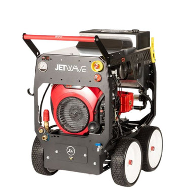 Jetwave petrol pressure cleaner on a wheeled trolley with red engine, control panel, and heavy-duty frame on a white background.