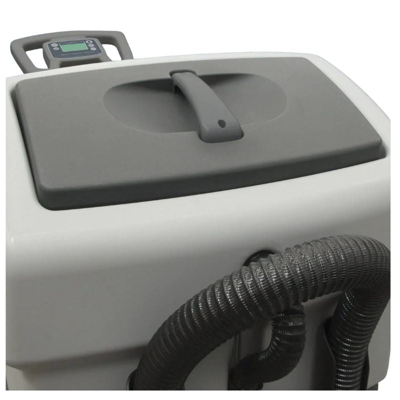 Top tank lid and hose connection area of Lavorwash ride-on scrubber