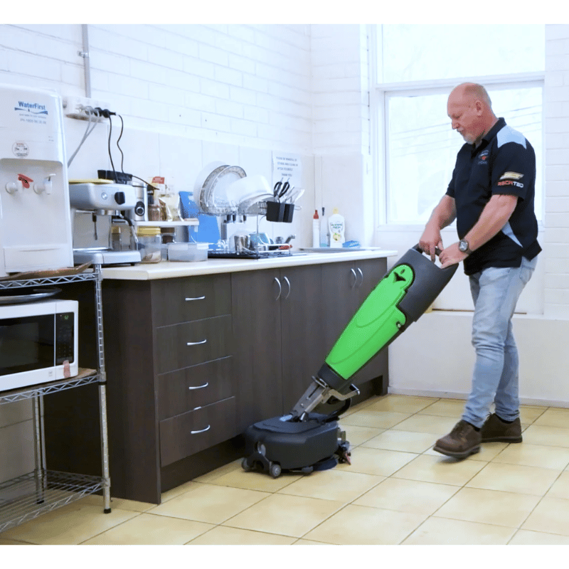 MIRA 40 - Battery Powered Compact Scrubber being used in a kitchen setting