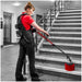 Motorscrubber Medium Length Floor Scrubber woman using the motorscrubber.