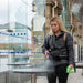 Motorscrubber Storm Wand Backpack Disinfectant Sprayer woman spraying on the surface