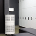 White Rensair Air Purifier with perforated design in a locker room setting.