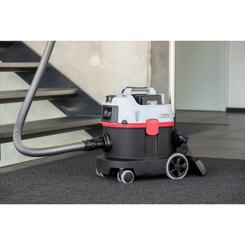 SPRiNTUS ERA iGO Cordless Canister Vacuum Cleaner on a carpet floor near stairs