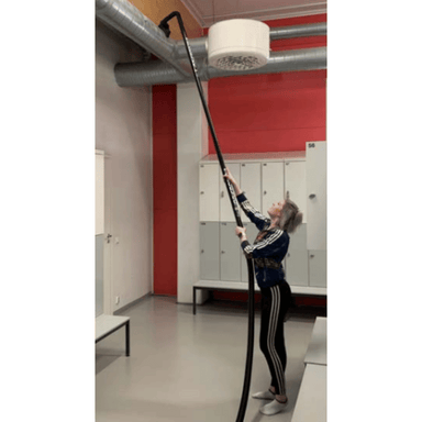 SpaceVac Interior Lite Vacuum Cleaner Kit SV38/LITE - person cleaning on top of duct in internal warehouse setting with spacevac kit.