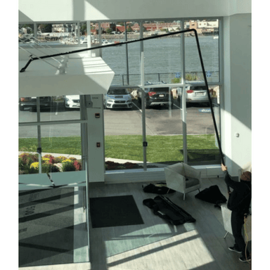 SpaceVac Interior Pro Vacuum Cleaner Kit SV38/PRO high reach on top of internal roof in office space setting