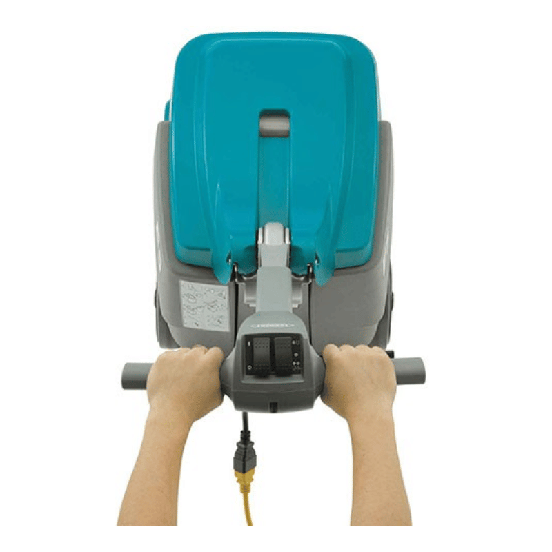 Tennant E5 Compact Walk Behind Carpet Extractor being pushed by a person on white background