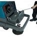 Tennant S10 Battery Walk Behind Floor Sweeper front compartment opening by a person