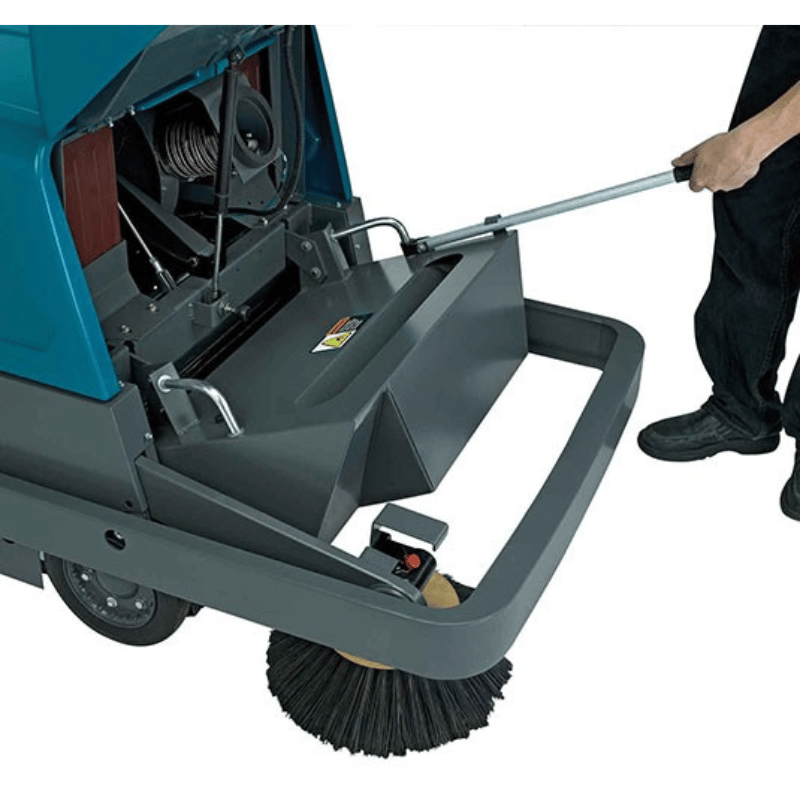 Tennant S10 Battery Walk Behind Floor Sweeper front compartment opening by a person