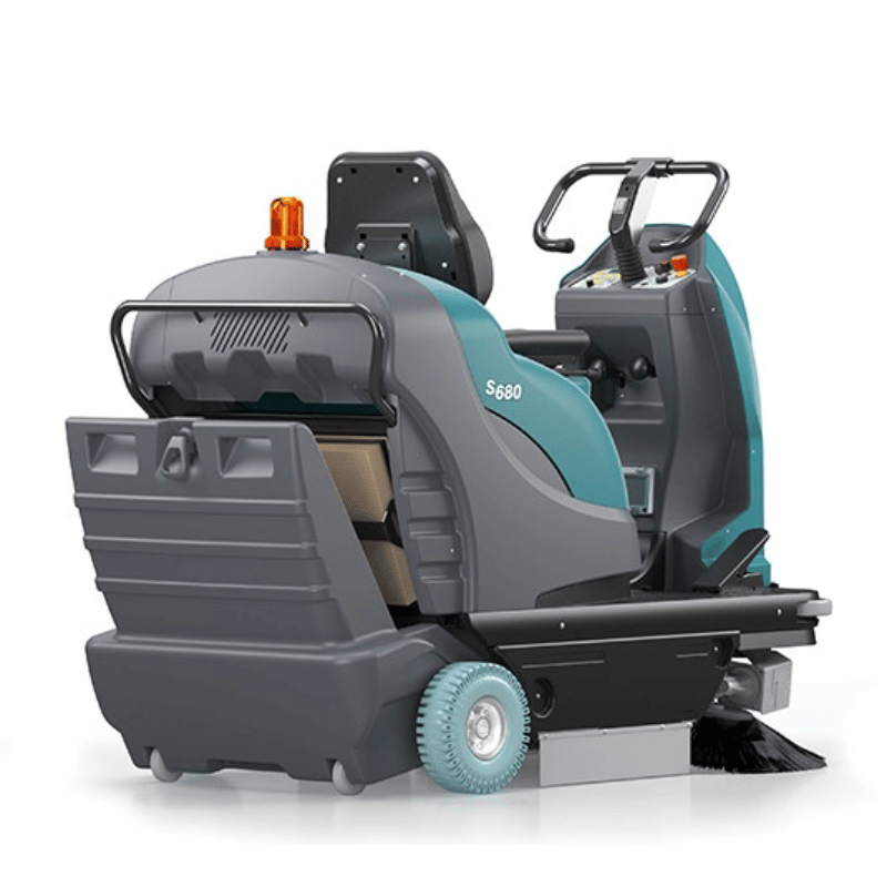 Tennant S680 Compact Ride On Floor Sweeper rear angle view on a white background