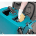 Tennant T2 Battery Walk behind Floor Scrubber person cleaning the inside of the machine