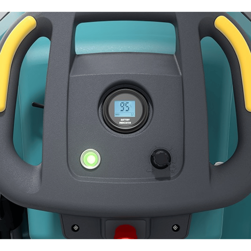 Close-up of a device with a digital display and control buttons on a gray background