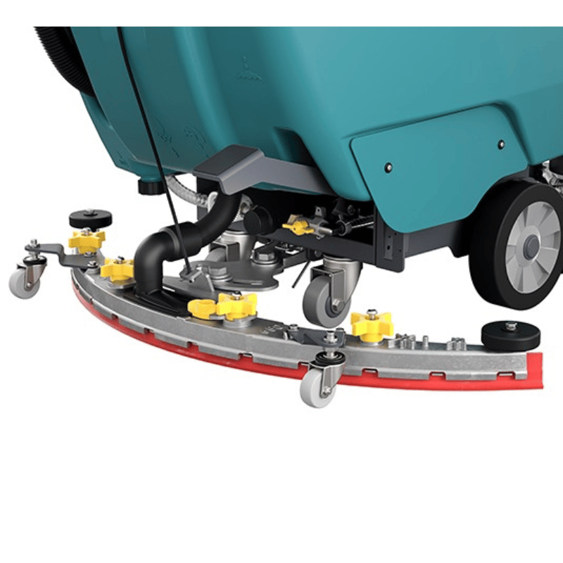Close-up of a Tennant T360 walk behind floor scrubber with visible components on a white background