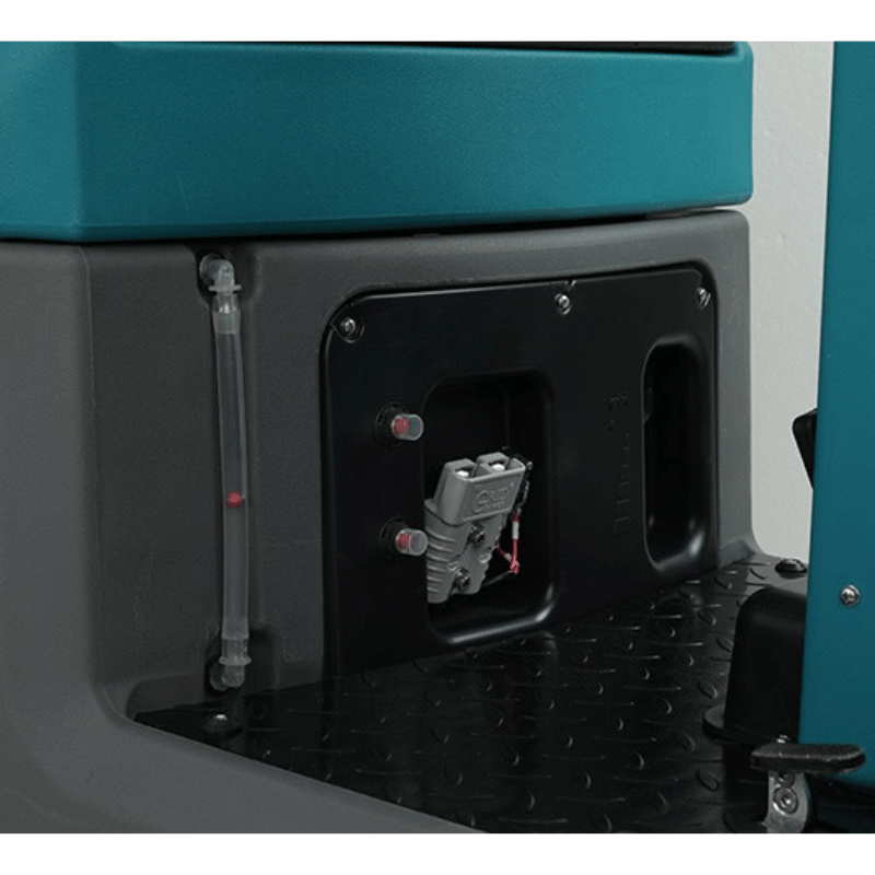 Close-up of a mechanical component on a Tennant T560 Micro Ride On Floor Scrubber