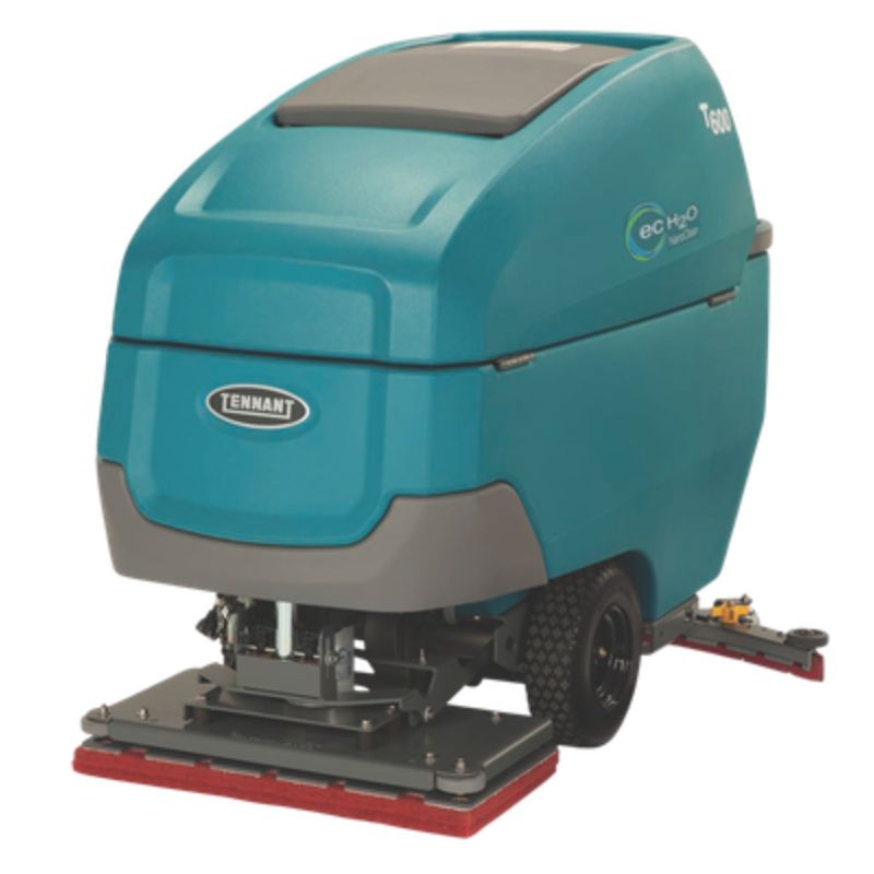 Tennant T600 700mm orbital walk behind floor scrubber front angle view on a blank white background. 