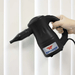 XPOWER Airrow Multipurpose Handheld Blower being used on curtains inside residence