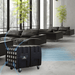Xpower AP2000 High Volume Commercial Air Scrubber with wheels in a modern room with large windows and plants.