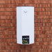 Cleanstar SD30 Central Ducted Vacuum System hanging on brown wall tiles