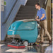 Tennant T500 Walk-Behind Floor Scrubber  men use it in cleaning